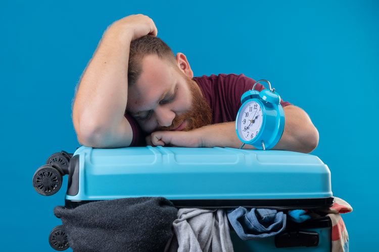 a young person frustrated because of the jet lag